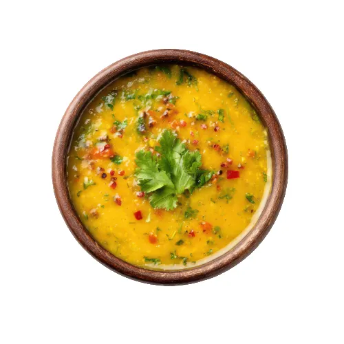 Traditional Chicken Haleem with meat, lentils, and fresh herbs